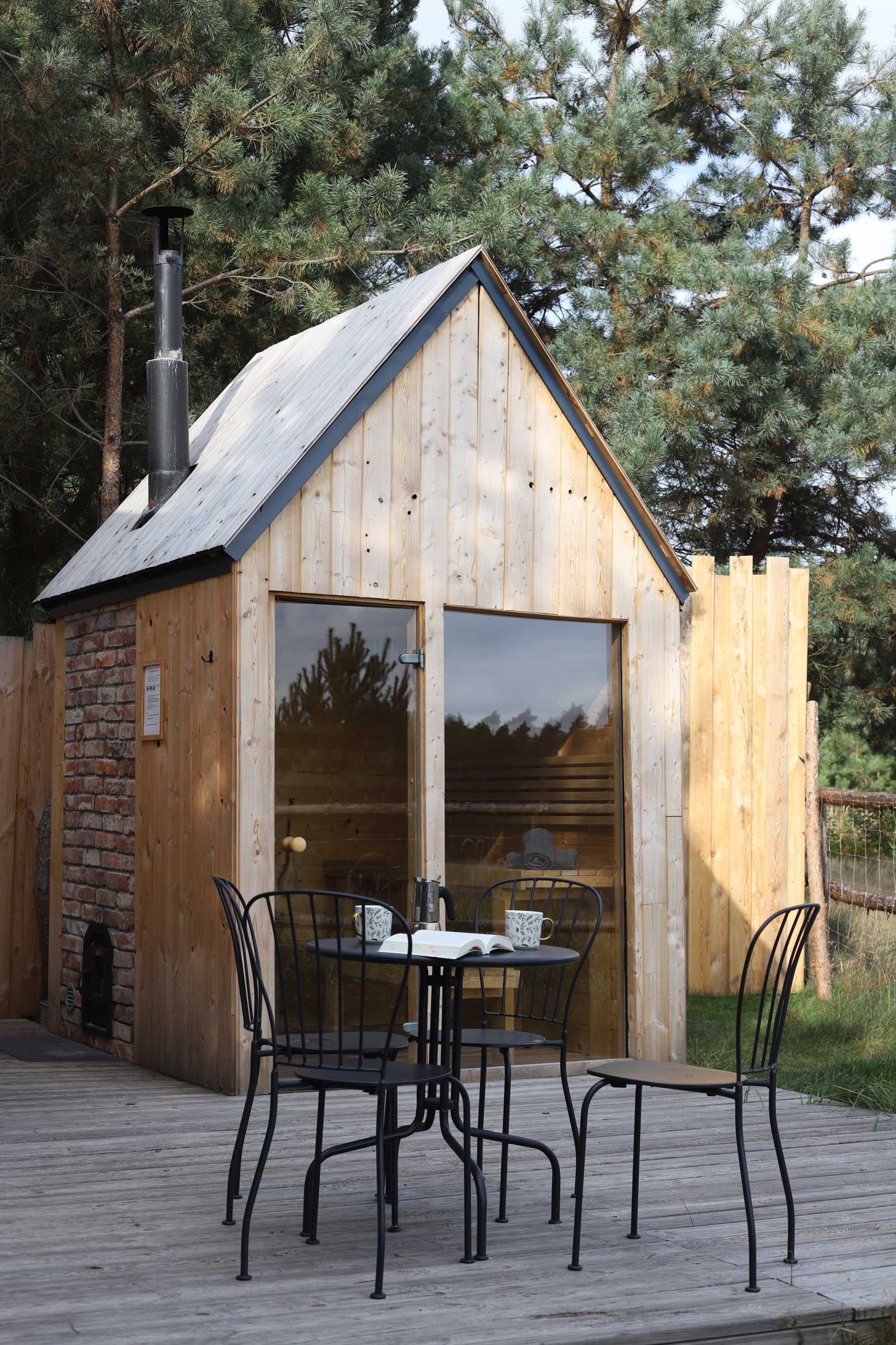 An outdoor wood-fired finish sauna